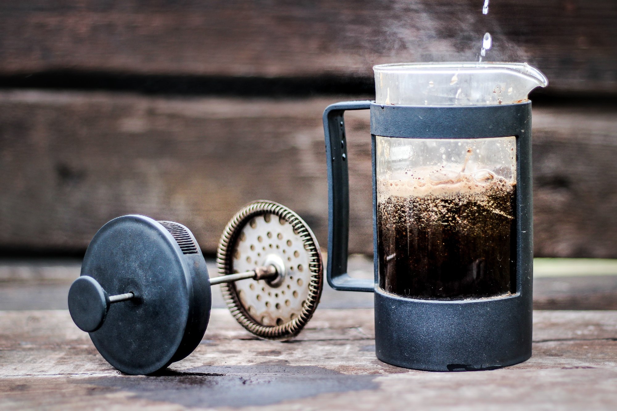 French press pot with coffee.